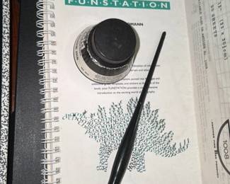 calligraphy set with dip pen, ink and paper pad