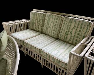 Vintage conservatory rattan couch. Part of a set: 2 chairs, ottoman and side table