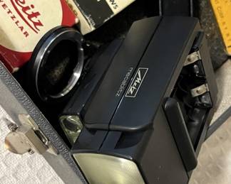 Lot 461 | Vintage Camera Accessories Flashes, Cords, etc
