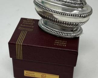 Lot 572 | Queen Anne Silver Plated Ronson Lighter
