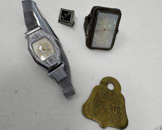 Lot 79 | Vintage As Found Jewelry Dog Tag Watch Ring
