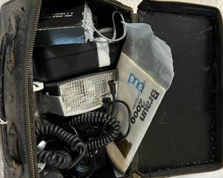 Lot 457 | Vintage Camera Accessories Flashes, Cords, etc
