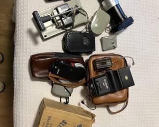 Lot 468 | Vintage Camera Accessories Flashes, Cords, etc
