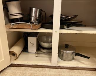 Lot 338 | Cabinet of Goodies Sifter, Pots Pans, Bakeware
