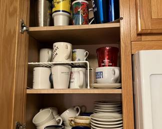 Lot 345 | Cabinet of Vintage Coffee Mugs, U of M, Funky,
