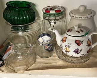 Lot 275 | Cabinet of Goodies Teapot, Glassware , Vases, etc
