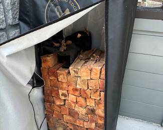 Cutting edge rack with firewood