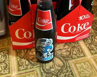1981-1982 UNC Tarheels National Champions 10 oz Coca-Cola bottle. Two six packs available. Sold individually or as a set.