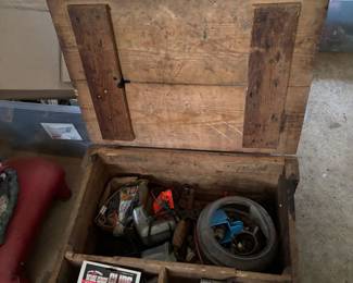 Very old tool chest with tools.