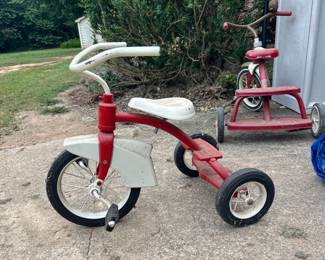 Antique AMC Tricycle. Metalwork is in good shape and tricycle “works”. Our father bought at an auction sale and had it redone around 2005. It has been stored in building since that time.