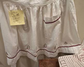 Handmade Christmas apron with embroidered Christmas trees.