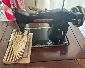 Modernage antique sewing machine.