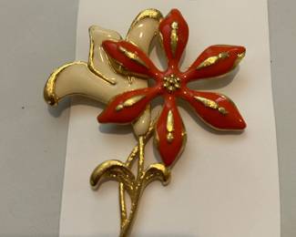 Vintage MONET Orange and cream enamel brooch.
This brooch is one of many brooches in a variety of styles.