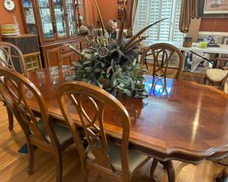 Available for presale- Dining room table and six chairs in very good condition with custom table pad.  Contact us by email or text for more information.