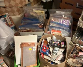 Paper crafting supplies, stencils, and adhesives