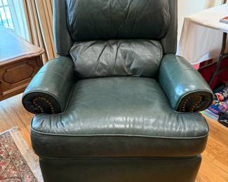 		#34	Bradington Young Leather Rocker Swivel Recliner -" as is squeaks"	 $60.00 								
