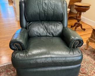 #33	Bradington Young Leather Rocker Swivel Recliner	 $75.00 