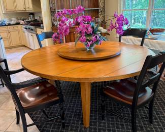 	#46	Round Drexel Table with 4 Chairs with Lazy Susan 68"X30"H	 $250.00 				
