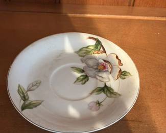 Vintage Porcelain Saucer with Floral Motif