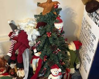 Christmas tree with snowman and Santa decorations