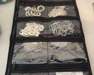 Jewelry Roll with Assorted Silver Chains and Charms