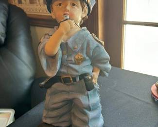 boy Police Officer Figurine