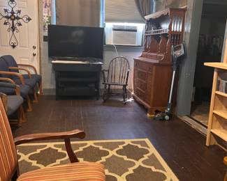 Covered chairs, recliners lazy boy, rocking chair, enamel tv stand, t and another hutch.