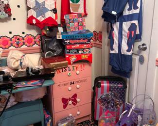 Quilt tops cleaned and pressed before she stored them. Children toys