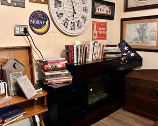 Movable fireplace. Cook books, 1 of 2 trunks. Both are in great shape.