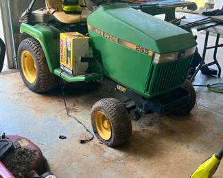 John Deere Riding mower this one needs a deck. Does run