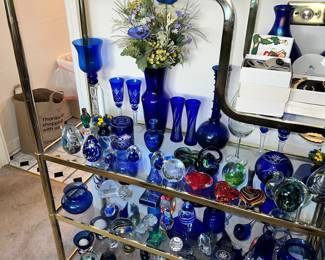 Stunning paperweight coll. Many from travels & many from Door County!