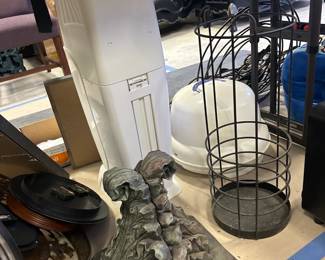 Shelves, baby items, and assorted decor