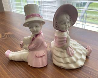Vintage ceramic book ends signed and numbered.