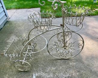 Vintage plant holder/lawn art