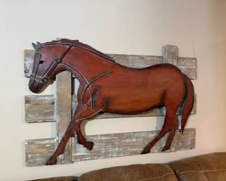 AMAZING WALL ART OF METAL HORSE AGAINST WOOD FENCE.