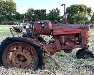 ANTIQUE McCORMICK FARMALL PROPANE TRACTOR.