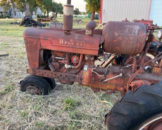 ANTIQUE McCORMICK FARMALL PROPANE TRACTOR.