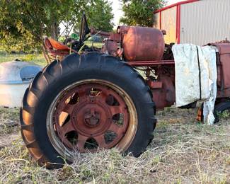 ANTIQUE PROPANE TRACTOR.