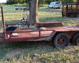 NICE STEEL HEAVY DUTY DOUBLE AXLE TRAILER GOING TO ADD TIRES PRIOR TO SALE.