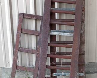 1 OF SEVERAL STEEL TRAILER RAMPS.
