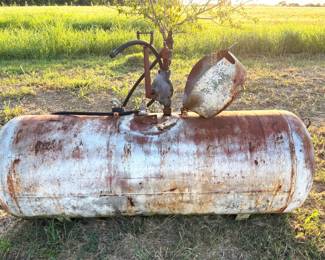 PROPANE TANK CONVERTED TO HAND PUMP DIESEL TANK.