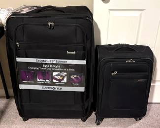 VERY NICE ROLLING SUIT CASES.