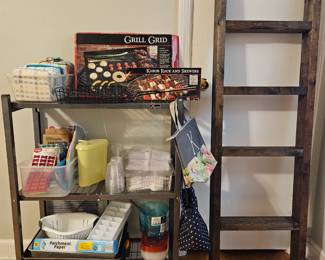 Folding metal shelf is the property of Seasons (Not For Sale)