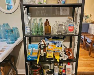 Folding metal shelf is the property of Seasons (Not For Sale)