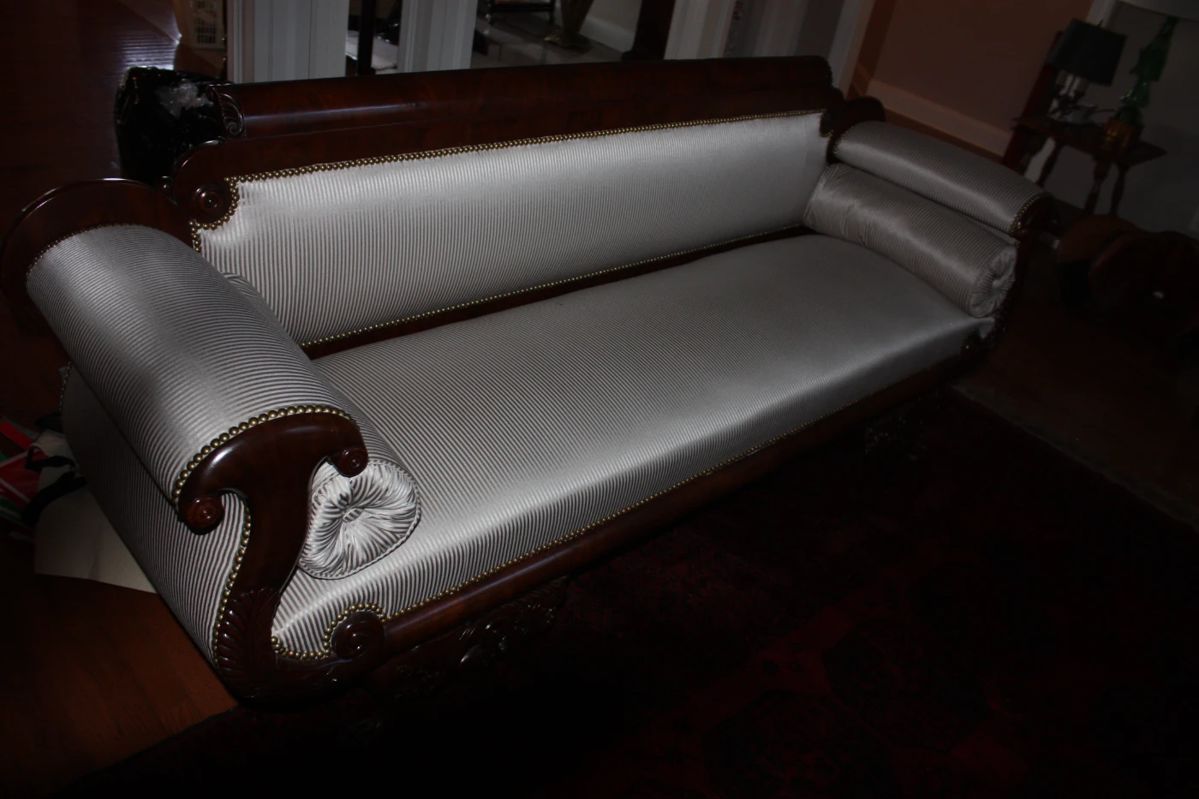 Unbelievable couch. Not a scratch or rip. Matching round pillows.