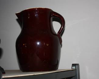 Brown crock pitcher