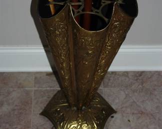Ornate gold umbrella stand