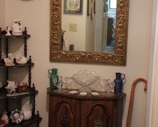 GOLD FRAMED MIRROR, 5 TIER CORNER SELF, WITH COLLECTIBLES AND ACCENT CABINET