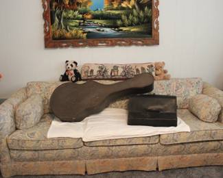 SOFA WITH GIBSON GUITAR AND ACCORDION