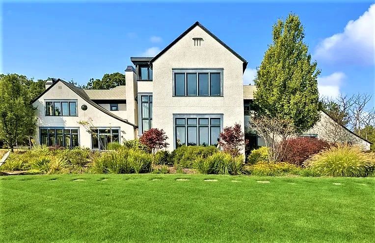 The design of this modern country cottage was inspired by the work of noted architect CFA Voysey!